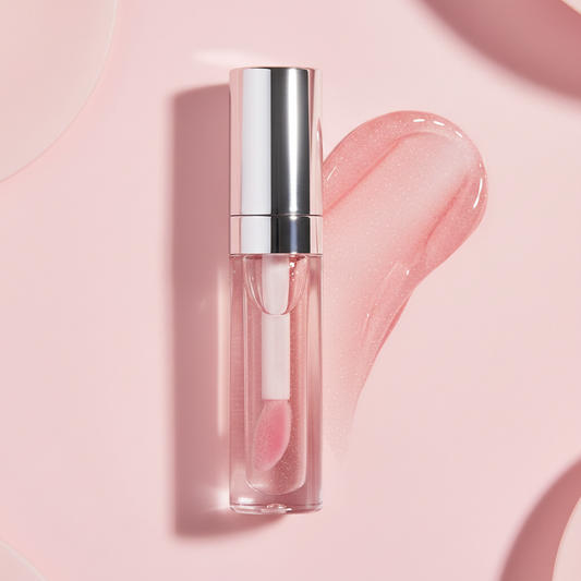 Sheer Pink Lip Gloss with swatch on pink background